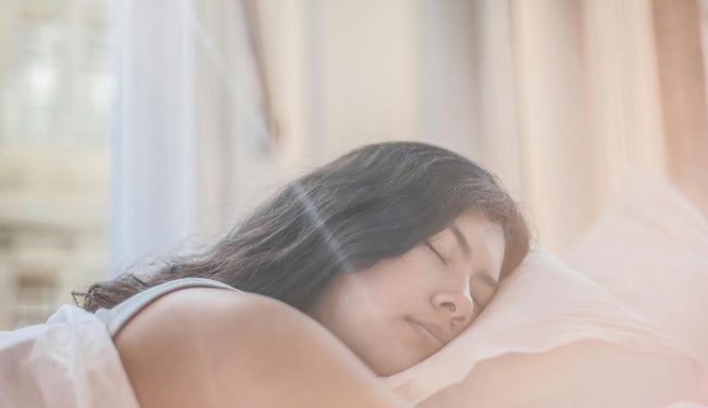 a woman sleeps in a bed – Dr. Dabber